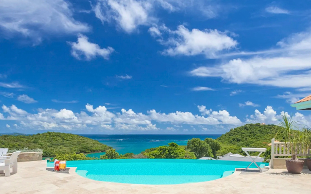 Image of Caribbean Serenity's pool overlooking the ocean